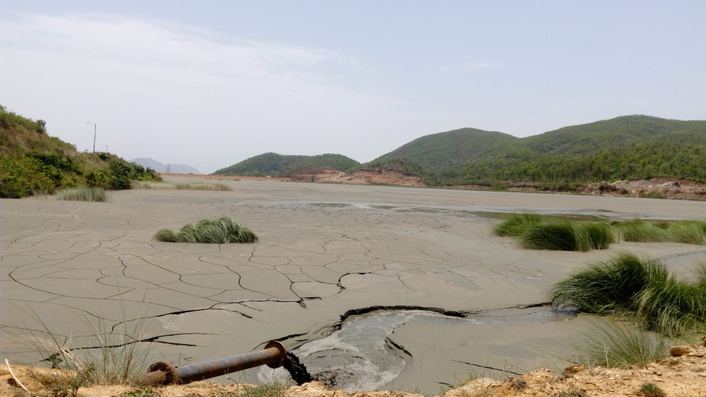 Open tailing dam in Turamdih where highly toxic waste is accumulated